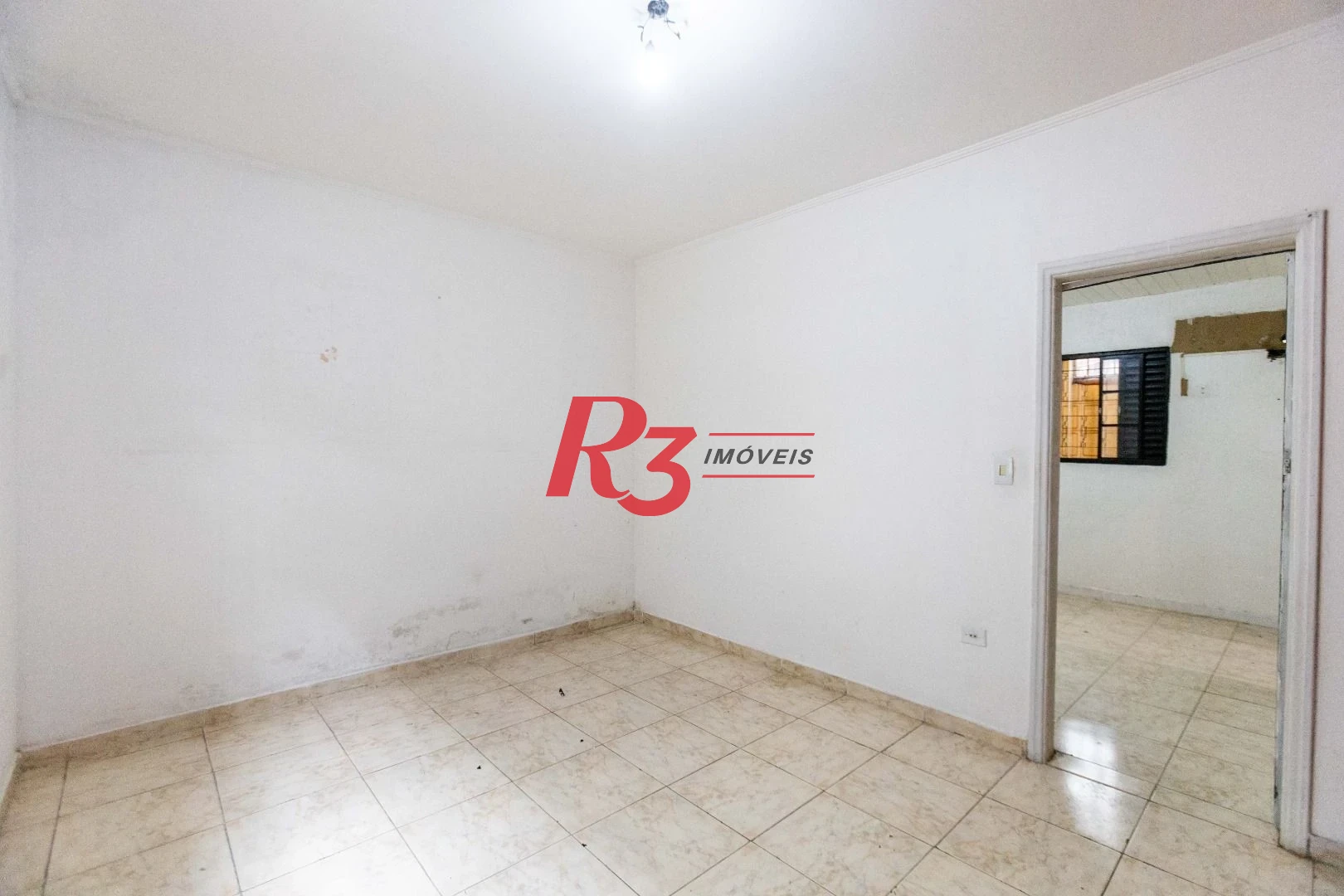 Casa com 2 dormitórios à venda, 64 m² por R$ 320.000,00 - Vila Marlthiaa - Santos/SP