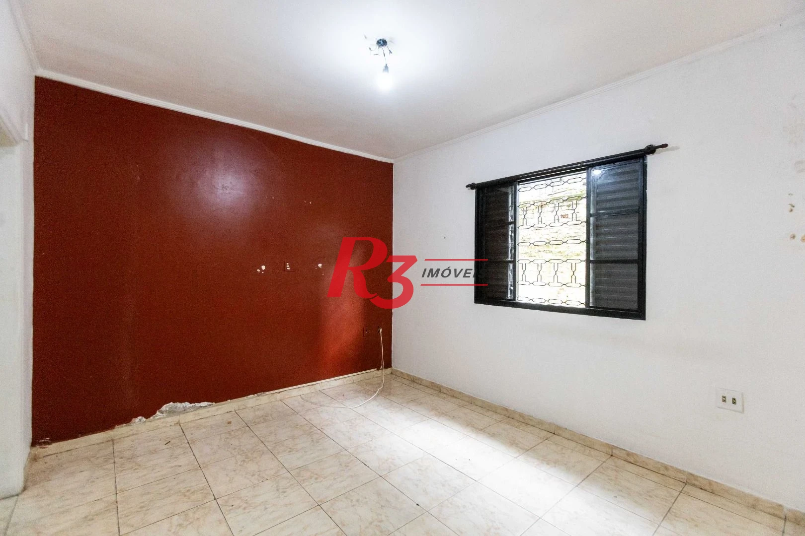 Casa com 2 dormitórios à venda, 64 m² por R$ 320.000,00 - Vila Marlthiaa - Santos/SP
