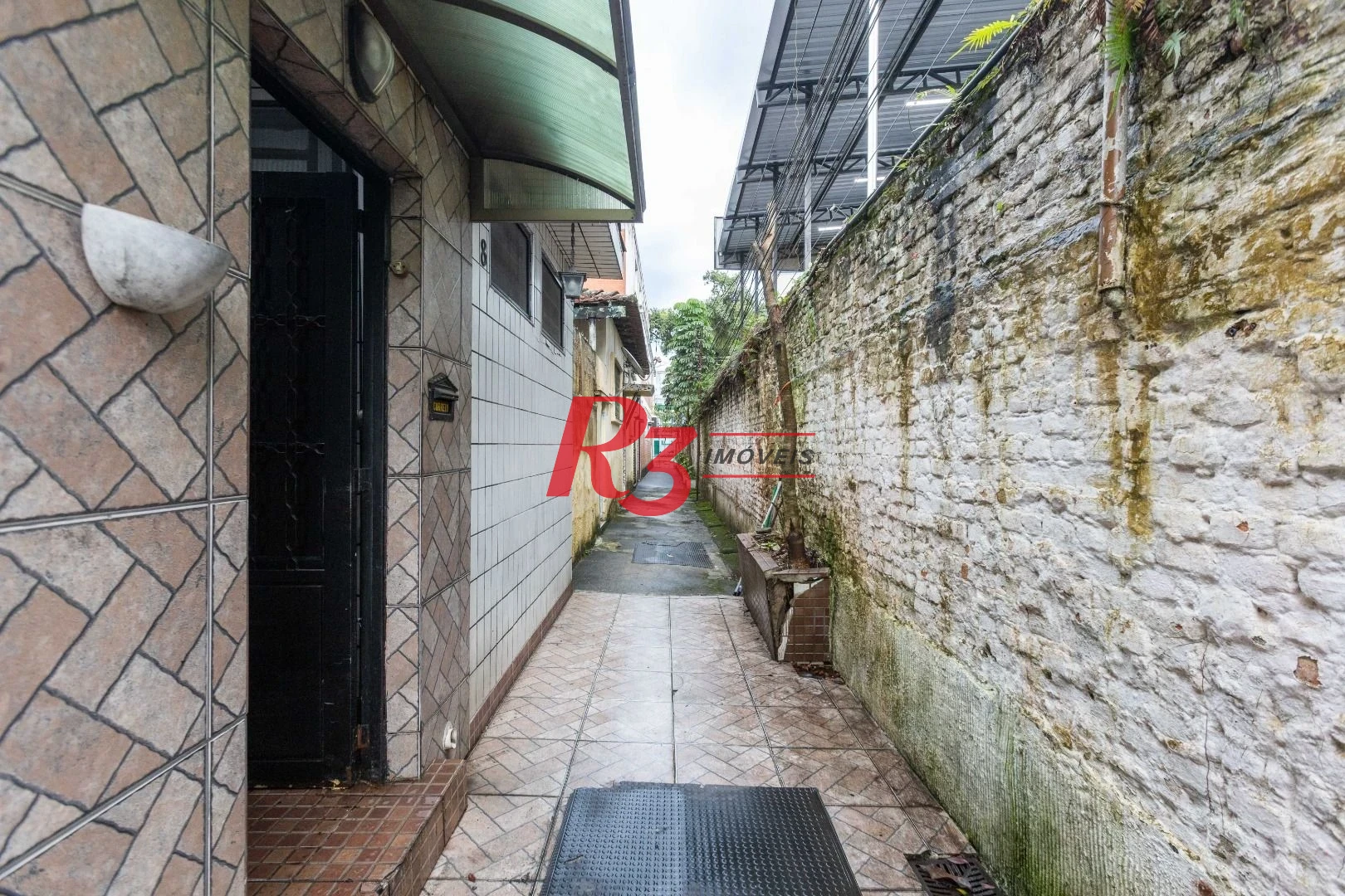 Casa com 2 dormitórios à venda, 64 m² por R$ 320.000,00 - Vila Marlthiaa - Santos/SP