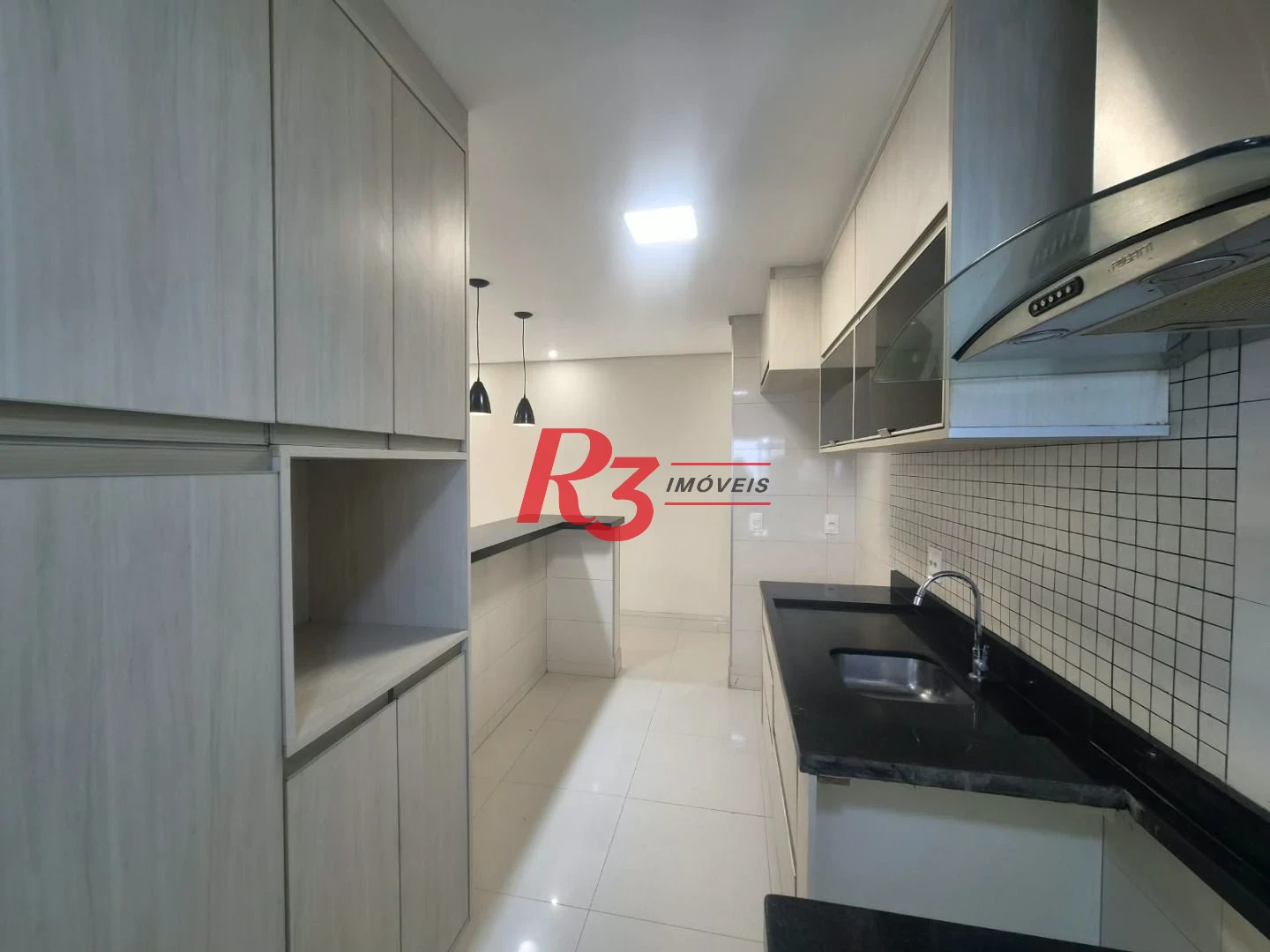 Apartamento com 3 dormitórios à venda, 77 m² por R$ 819.000,00 - Ponta da Praia - Santos/SP