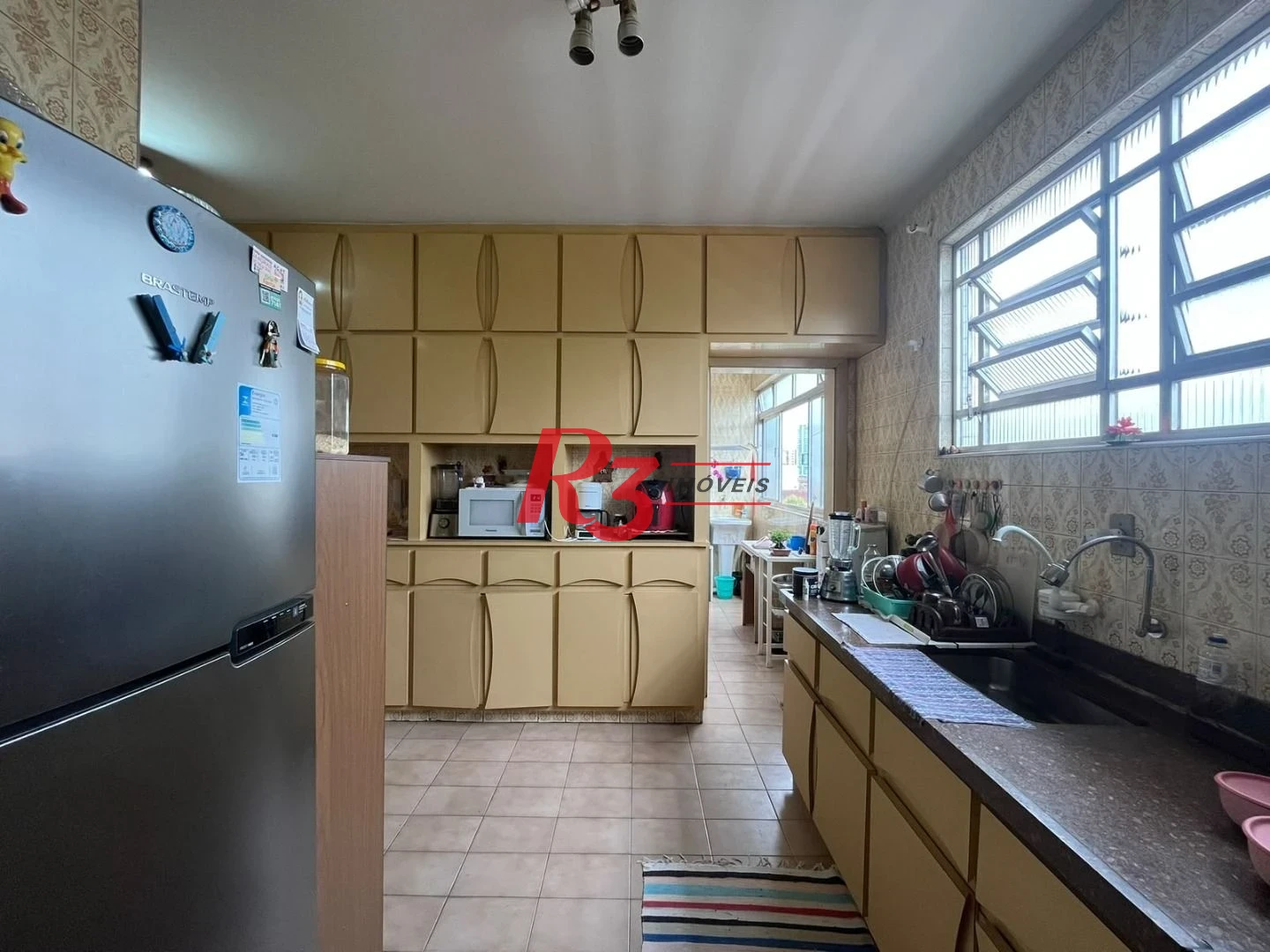 Apartamento de 3 dormitórios à venda no Embaré + dependência completa