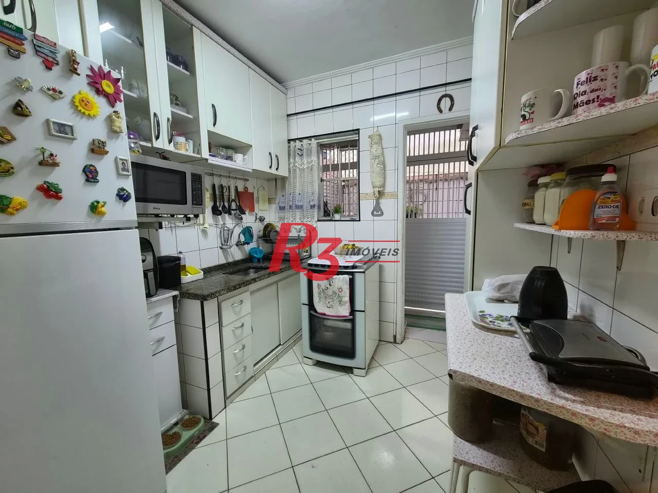 Apartamento com 2 dormitórios à venda, 71 m² por R$ 399.000,00 - Embaré - Santos/SP