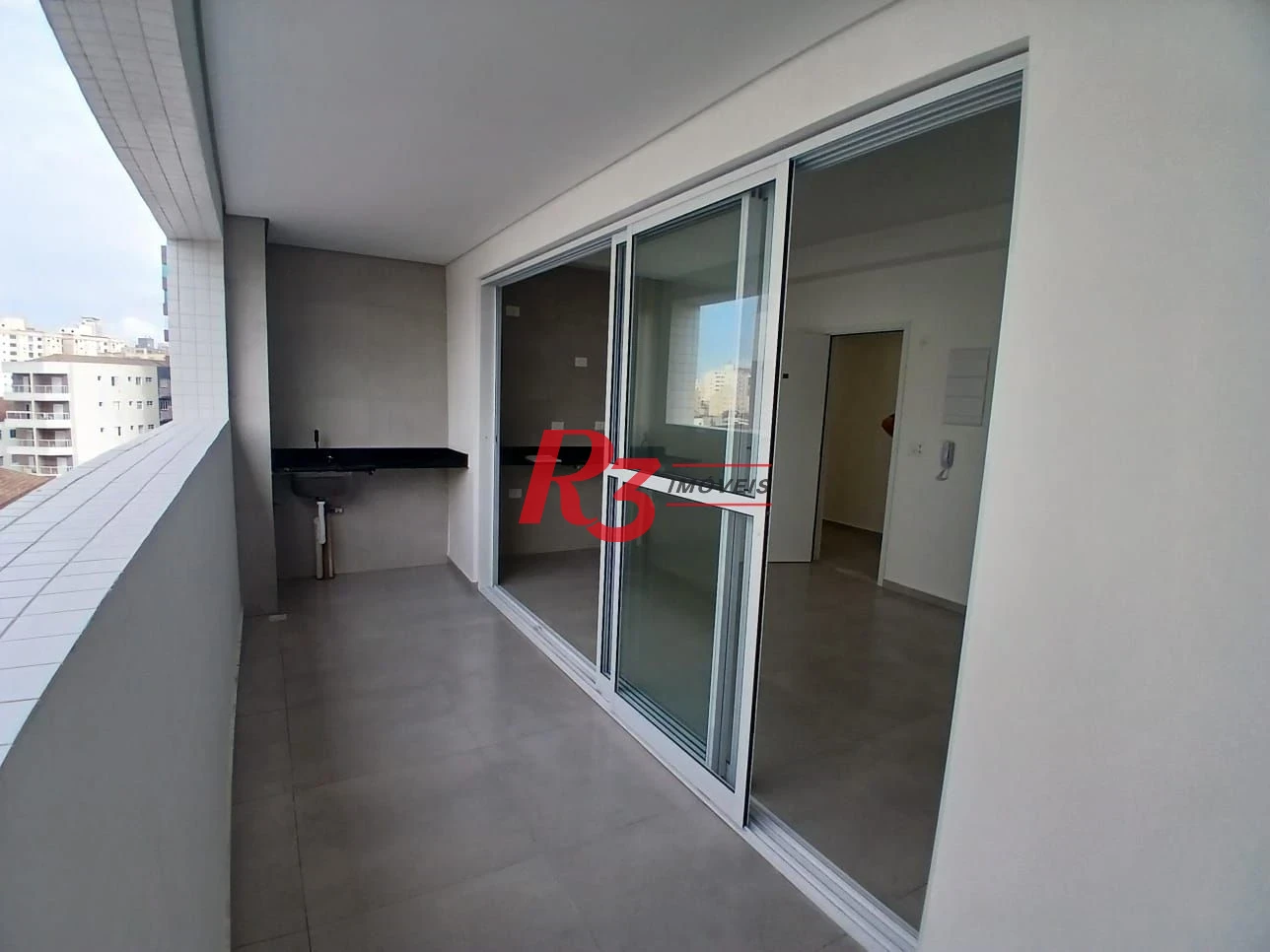 Apartamento com 2 dormitórios à venda, 59 m² por R$ 570.000,00 - Macuco - Santos/SP