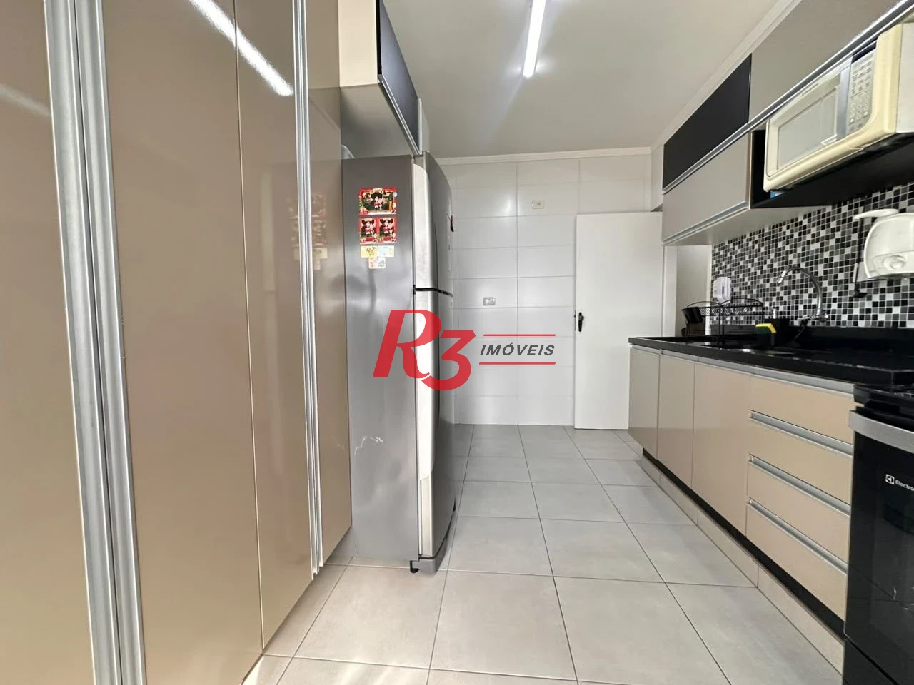 Apartamento com 2 dormitórios à venda, 74 m² por R$ 565.000,00 - Embaré - Santos/SP