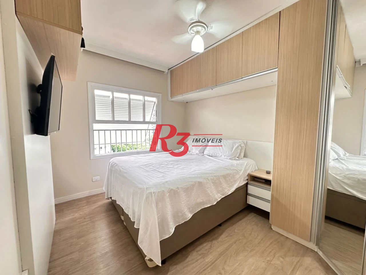 Apartamento com 2 dormitórios à venda, 74 m² por R$ 565.000,00 - Embaré - Santos/SP