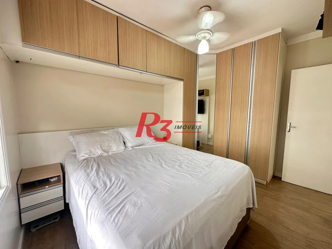 Apartamento com 2 dormitórios à venda, 74 m² por R$ 565.000,00 - Embaré - Santos/SP