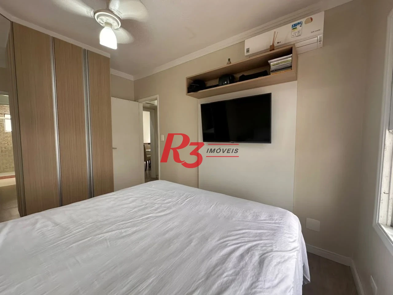 Apartamento com 2 dormitórios à venda, 74 m² por R$ 565.000,00 - Embaré - Santos/SP