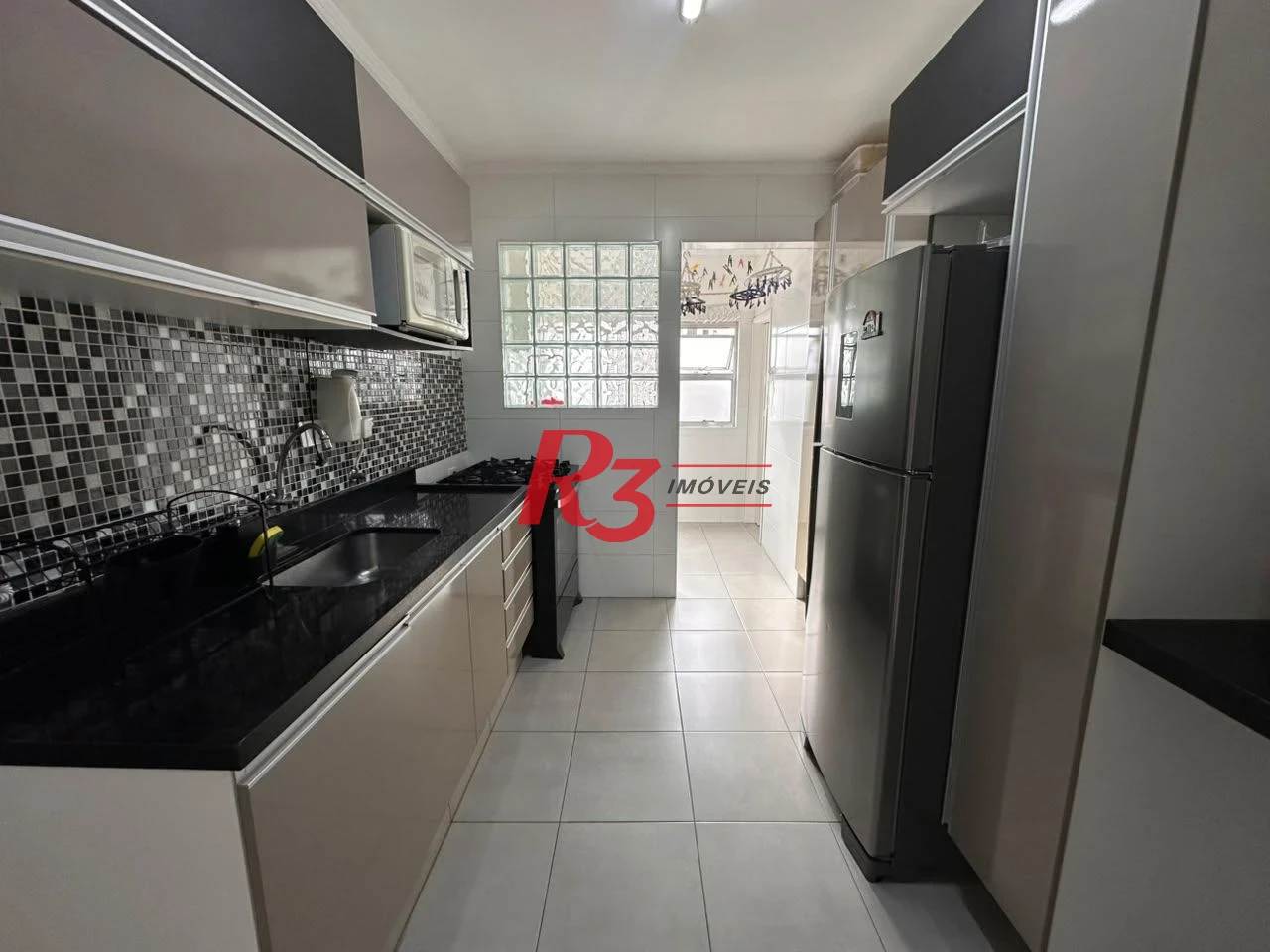 Apartamento com 2 dormitórios à venda, 74 m² por R$ 565.000,00 - Embaré - Santos/SP
