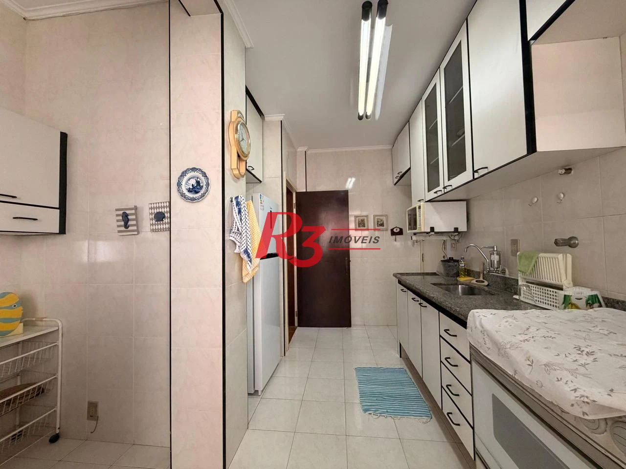 Apartamento com 2 dormitórios à venda, 100 m² por R$ 750.000,00 - Gonzaga - Santos/SP