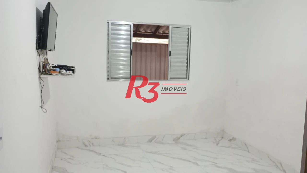 Casa com 2 dormitórios à venda, 55 m² por R$ 400.000,00 - Estuário - Santos/SP