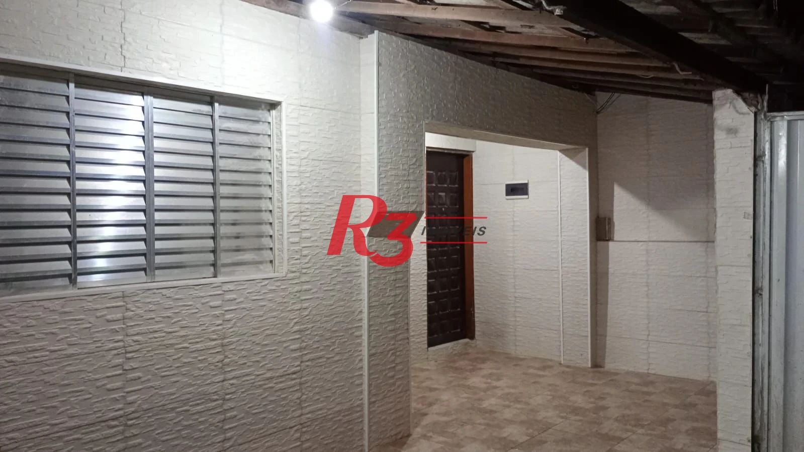 Casa com 2 dormitórios à venda, 55 m² por R$ 400.000,00 - Estuário - Santos/SP