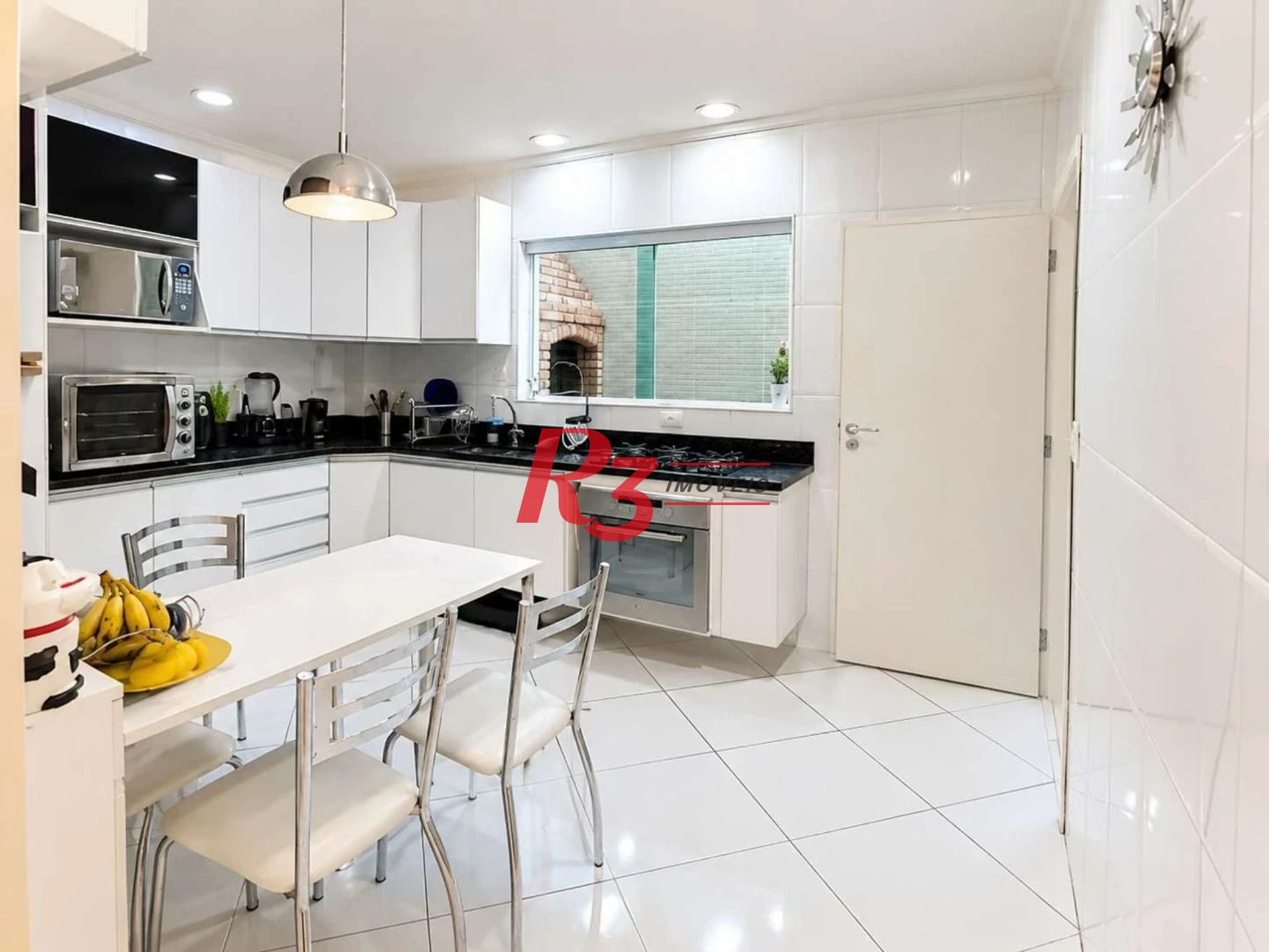 Casa com 3 dormitórios à venda, 150 m² por R$ 1.120.000,00 - Vila Matias - Santos/SP