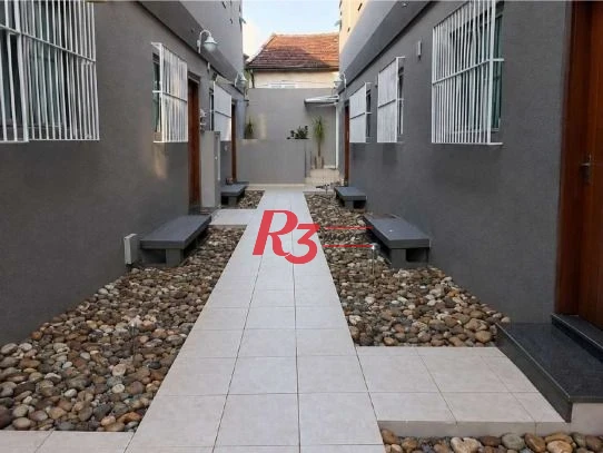 Casa com 3 dormitórios à venda, 150 m² por R$ 1.120.000,00 - Vila Matias - Santos/SP