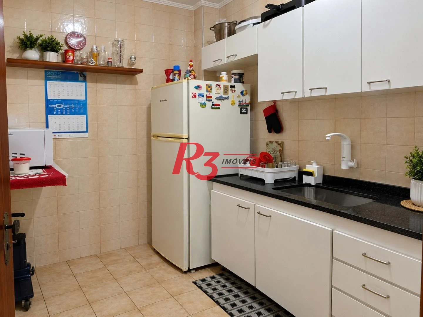 Apartamento com 2 dormitórios à venda, 73 m² por R$ 638.000,00 - Embaré - Santos/SP