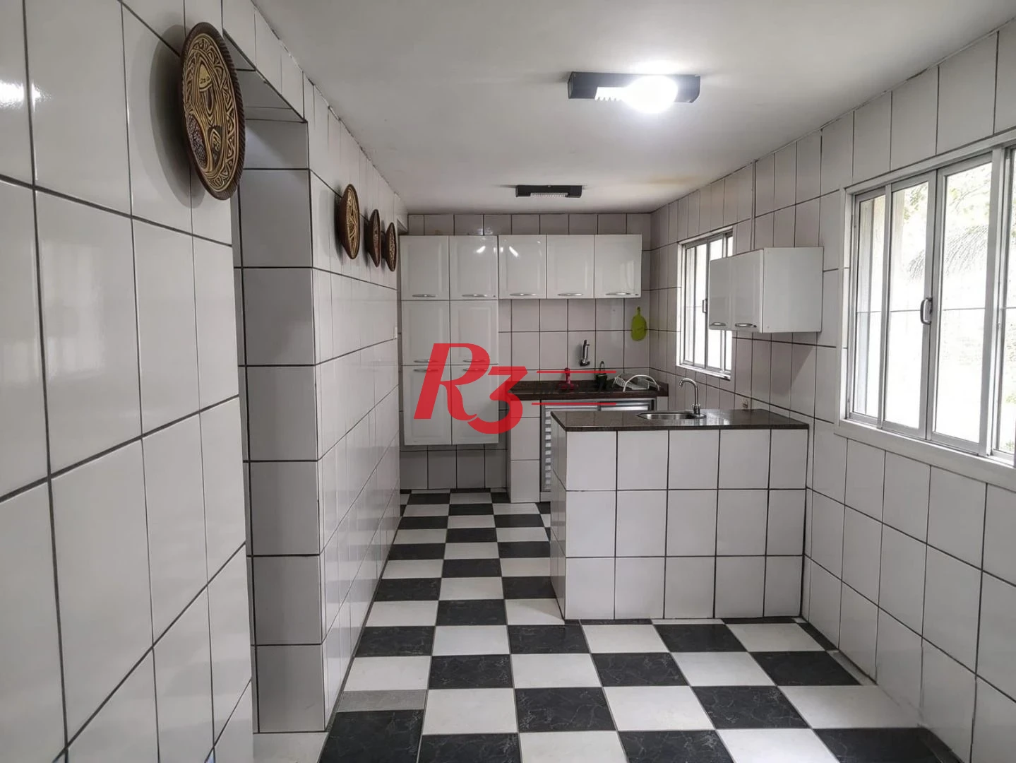 Sobrado com 2 dormitórios à venda, 180 m² por R$ 639.000,00 - Marapé - Santos/SP