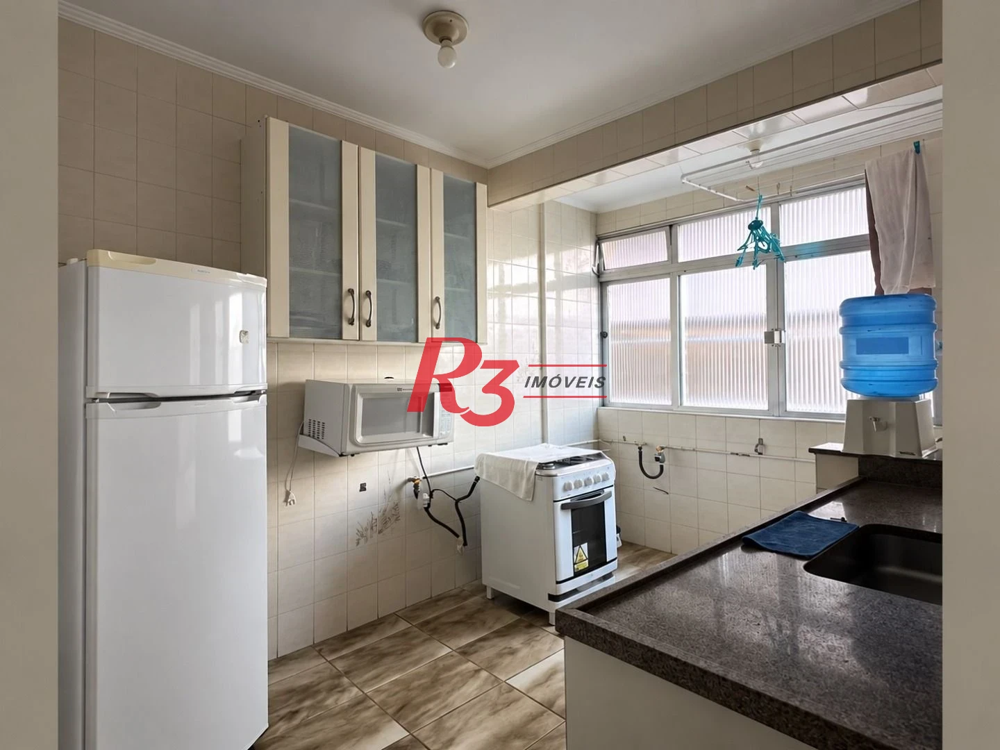 Apartamento com 2 dormitórios à venda, 63 m² por R$ 600.000,00 - Gonzaga - Santos/SP