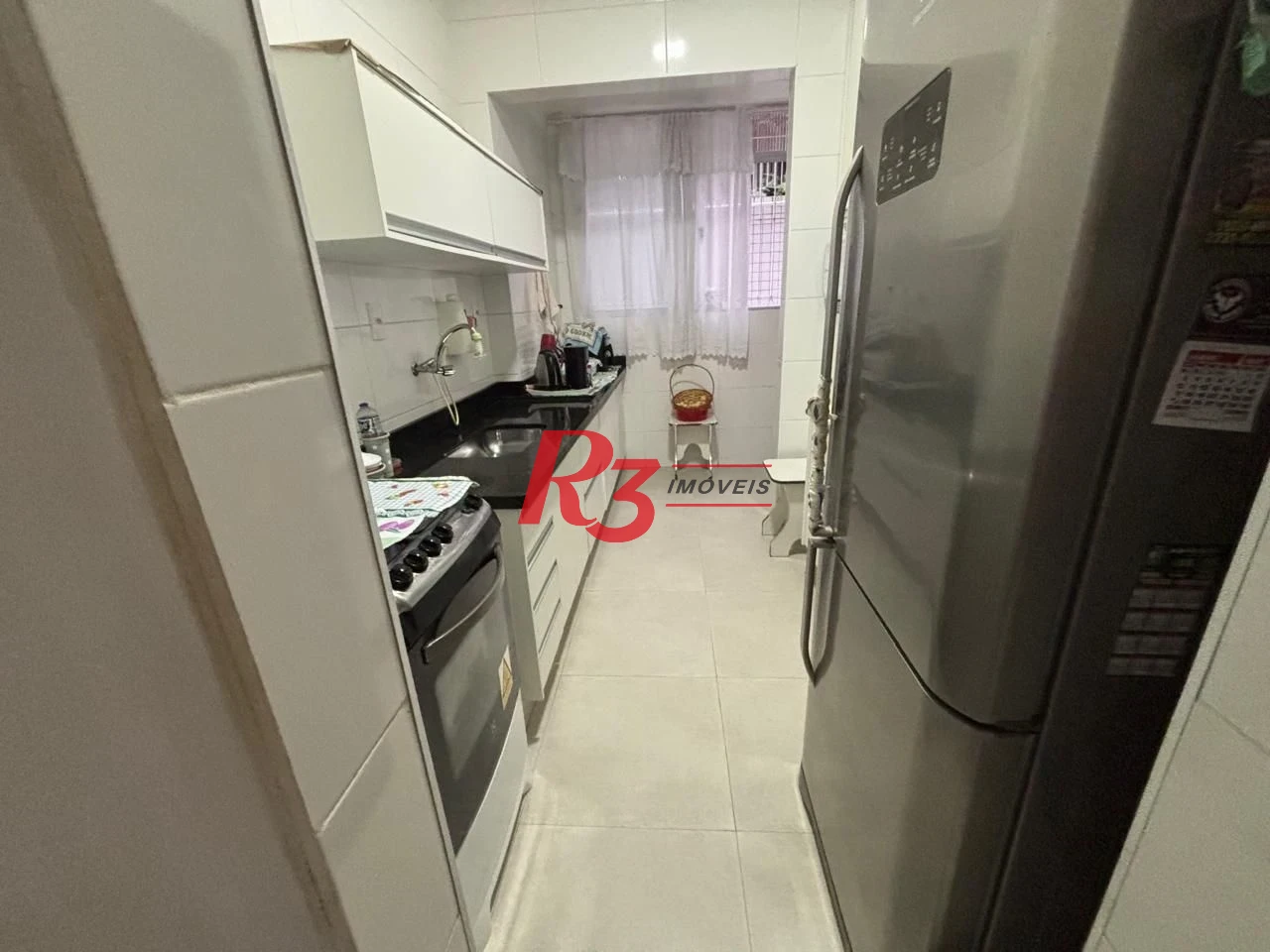 Apartamento com 2 dormitórios à venda, 75 m² por R$ 420.000,00 - Embaré - Santos/SP