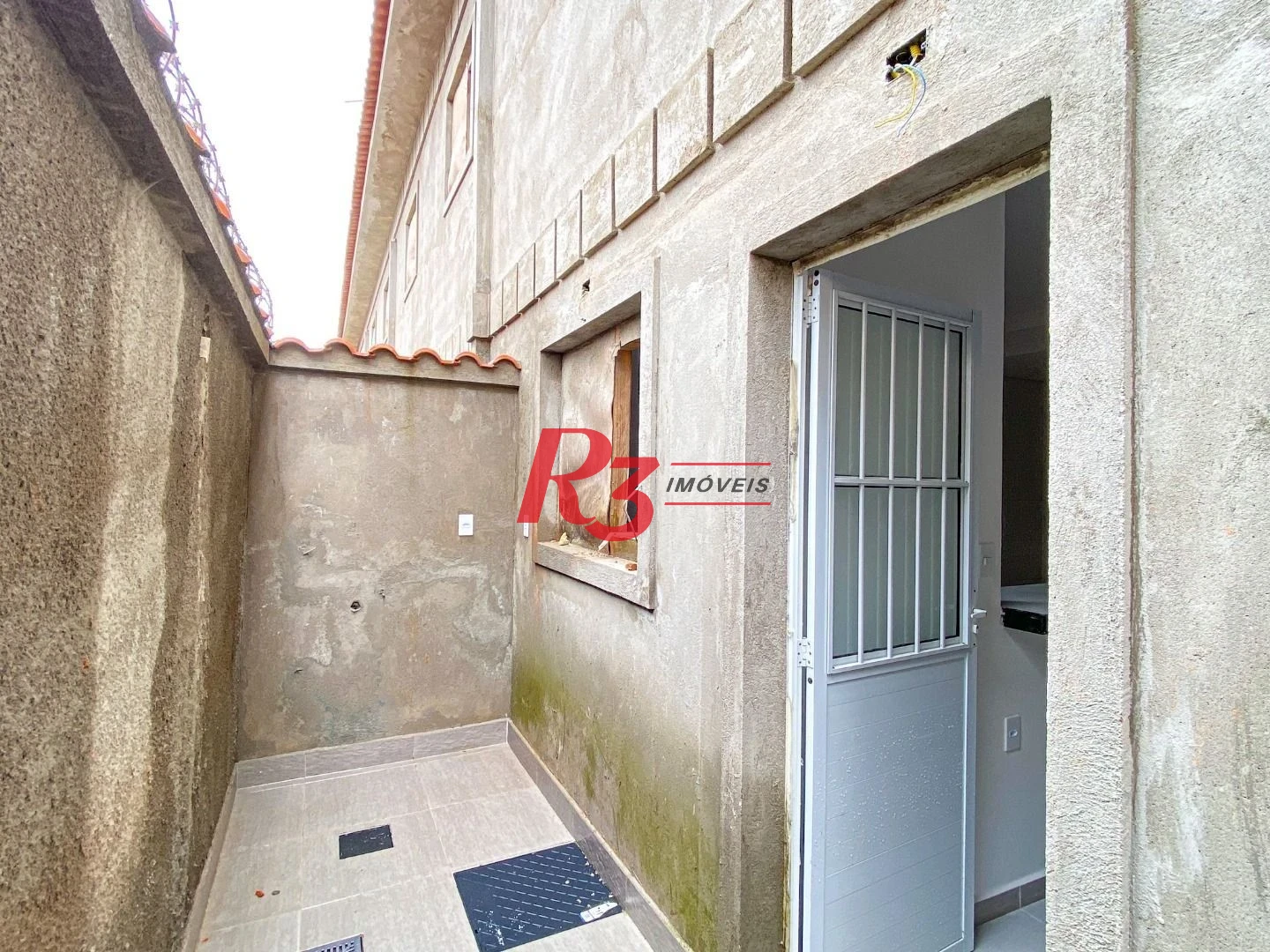 Village com 2 dormitórios à venda, 91 m² por R$ 439.000,00 - Morro de Nova Cintra - Santos/SP