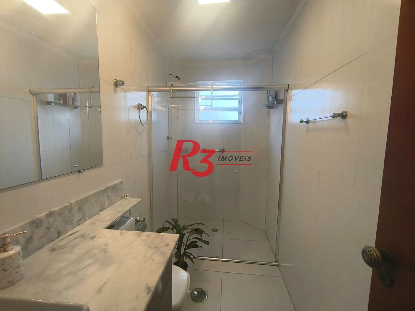 Apartamento com 2 dormitórios à venda, 110 m² por R$ 700.000,00 - Embaré - Santos/SP