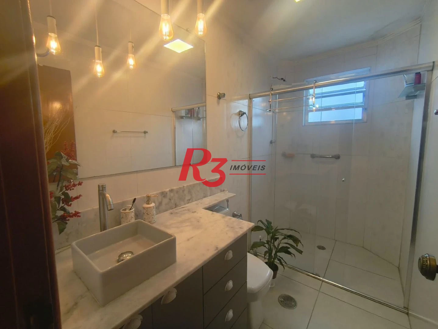 Apartamento com 2 dormitórios à venda, 110 m² por R$ 700.000,00 - Embaré - Santos/SP
