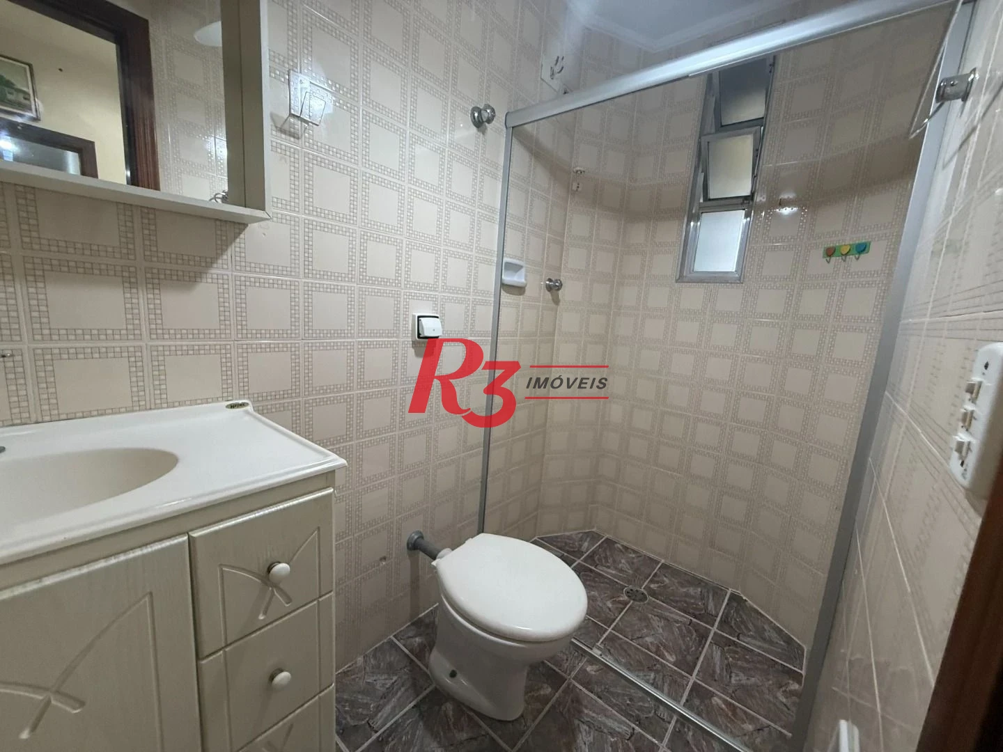 Apartamento com 3 dormitórios à venda, 117 m² por R$ 650.000,00 - Gonzaga - Santos/SP