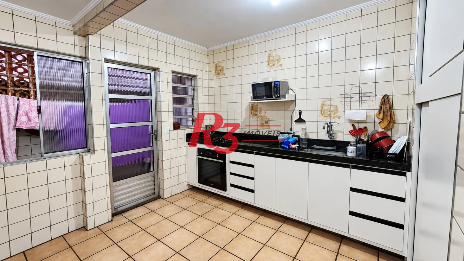 Casa com 2 dormitórios à venda, 70 m² por R$ 370.000,00 - Jabaquara - Santos/SP
