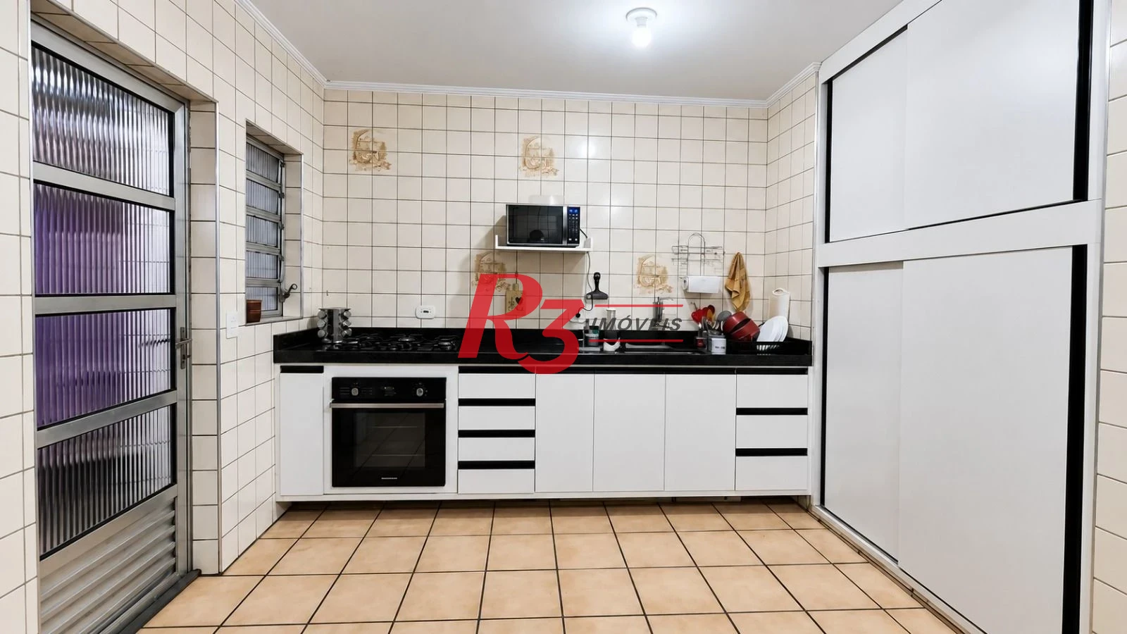 Casa com 2 dormitórios à venda, 70 m² por R$ 370.000,00 - Jabaquara - Santos/SP