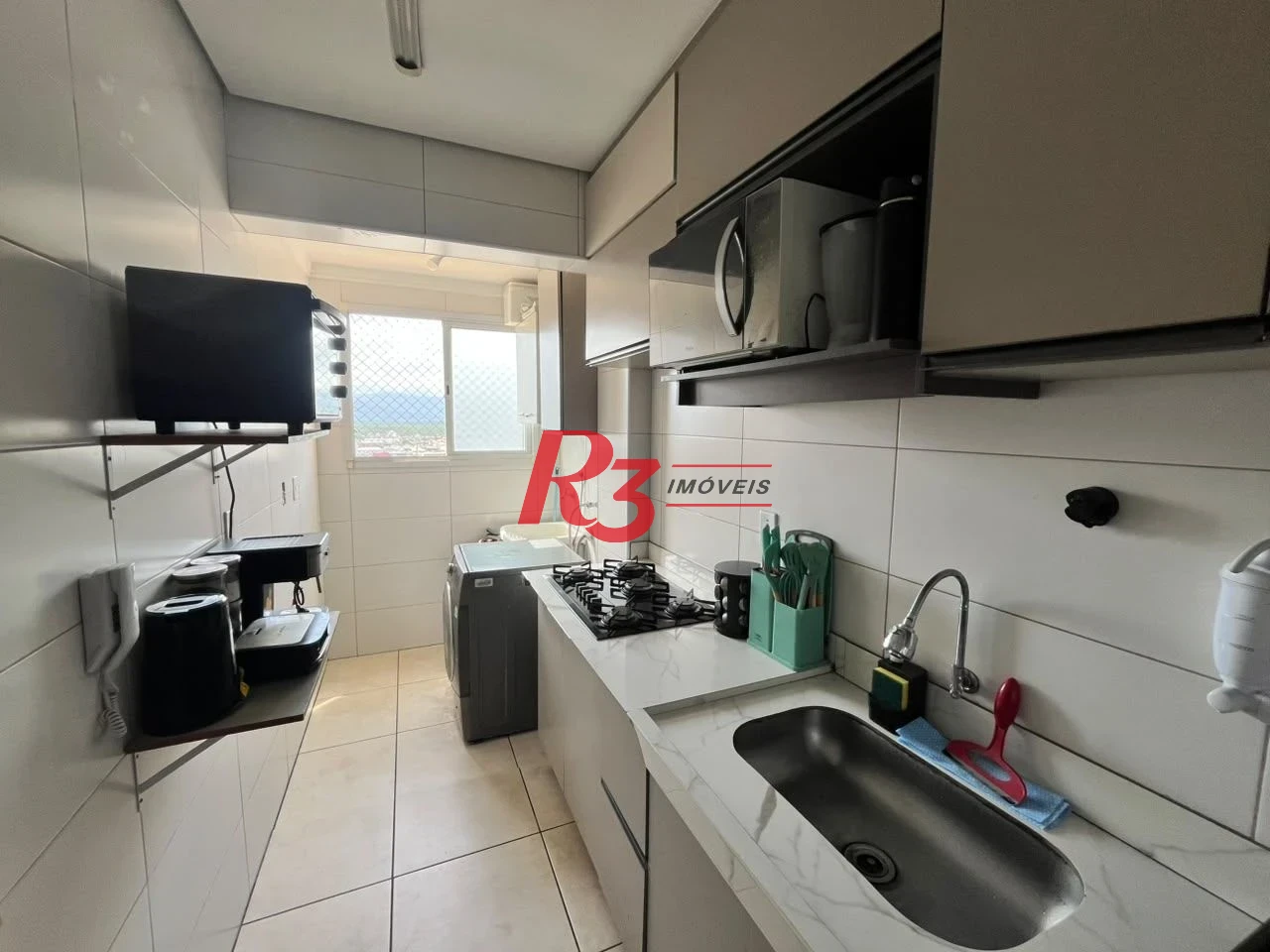 Apartamento com 2 dormitórios à venda, 58 m² por R$ 430.000,00 - Vila Guilhermina - Praia Grande/SP