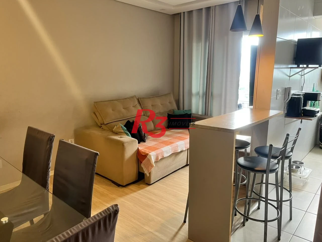 Apartamento com 2 dormitórios à venda, 58 m² por R$ 430.000,00 - Vila Guilhermina - Praia Grande/SP