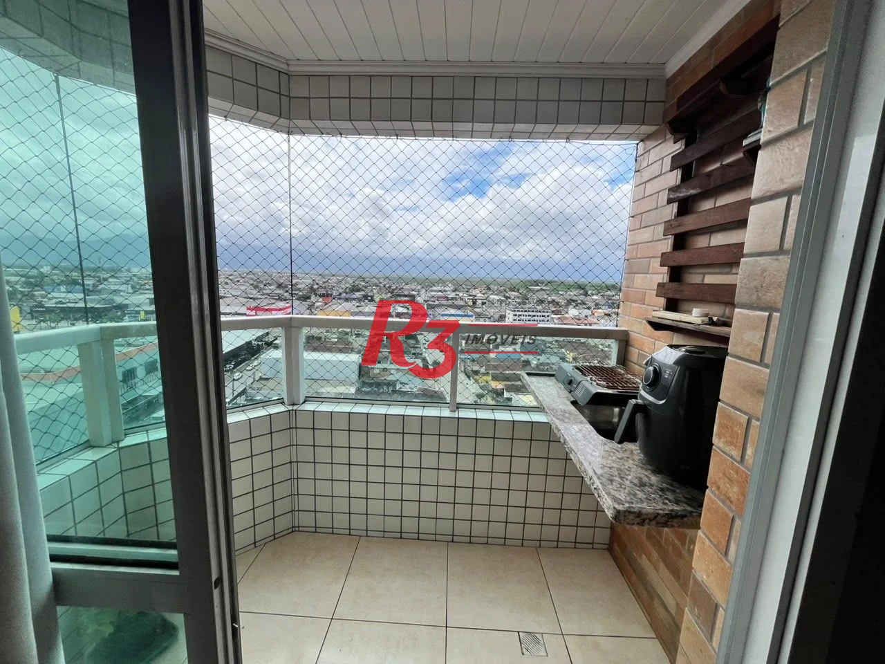 Apartamento com 2 dormitórios à venda, 58 m² por R$ 430.000,00 - Vila Guilhermina - Praia Grande/SP