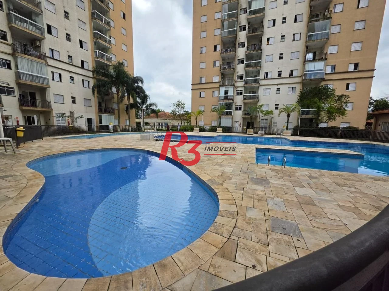 Apartamento com 2 dormitórios à venda, 53 m² por R$ 390.000,00 - Areia Branca - Santos/SP
