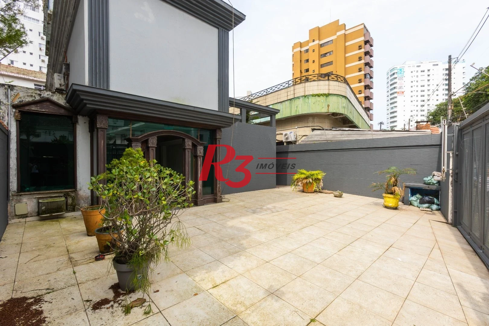Sobrado com 3 dormitórios à venda, 260 m² por R$ 1.810.000,00 - Ponta da Praia - Santos/SP