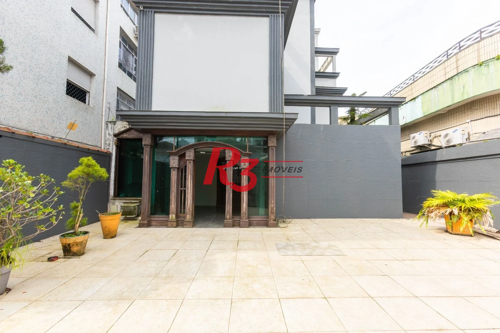 Sobrado com 3 dormitórios à venda, 260 m² por R$ 1.810.000,00 - Ponta da Praia - Santos/SP