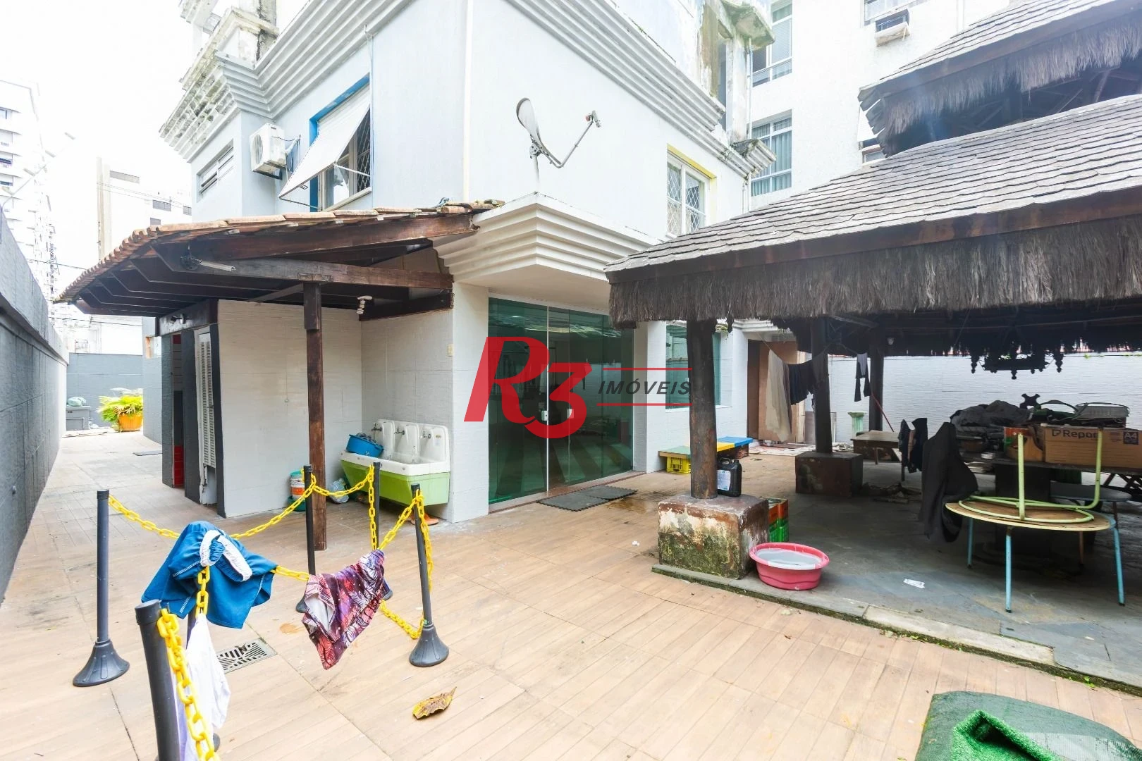 Sobrado com 3 dormitórios à venda, 260 m² por R$ 1.810.000,00 - Ponta da Praia - Santos/SP
