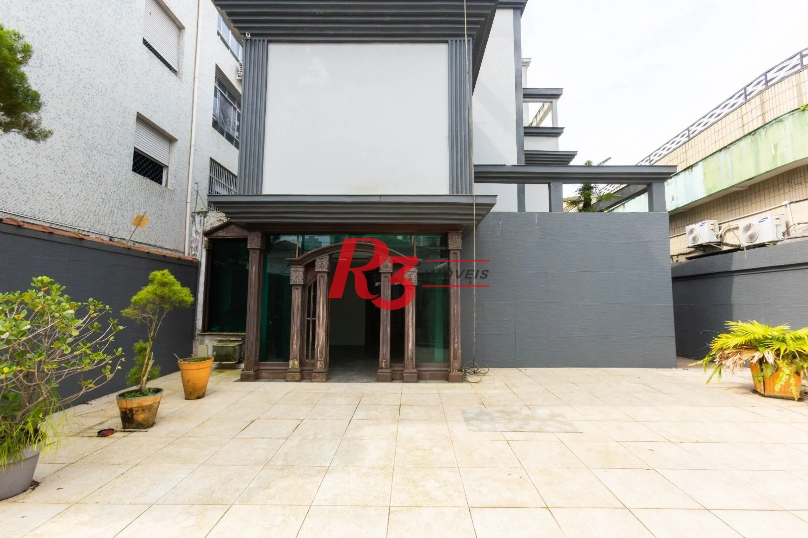 Sobrado com 3 dormitórios à venda, 260 m² por R$ 1.810.000,00 - Ponta da Praia - Santos/SP