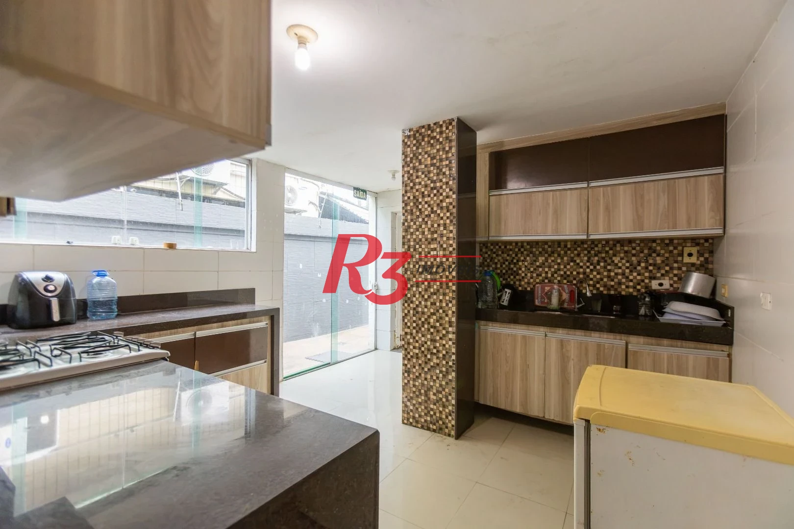 Sobrado com 3 dormitórios à venda, 260 m² por R$ 1.810.000,00 - Ponta da Praia - Santos/SP