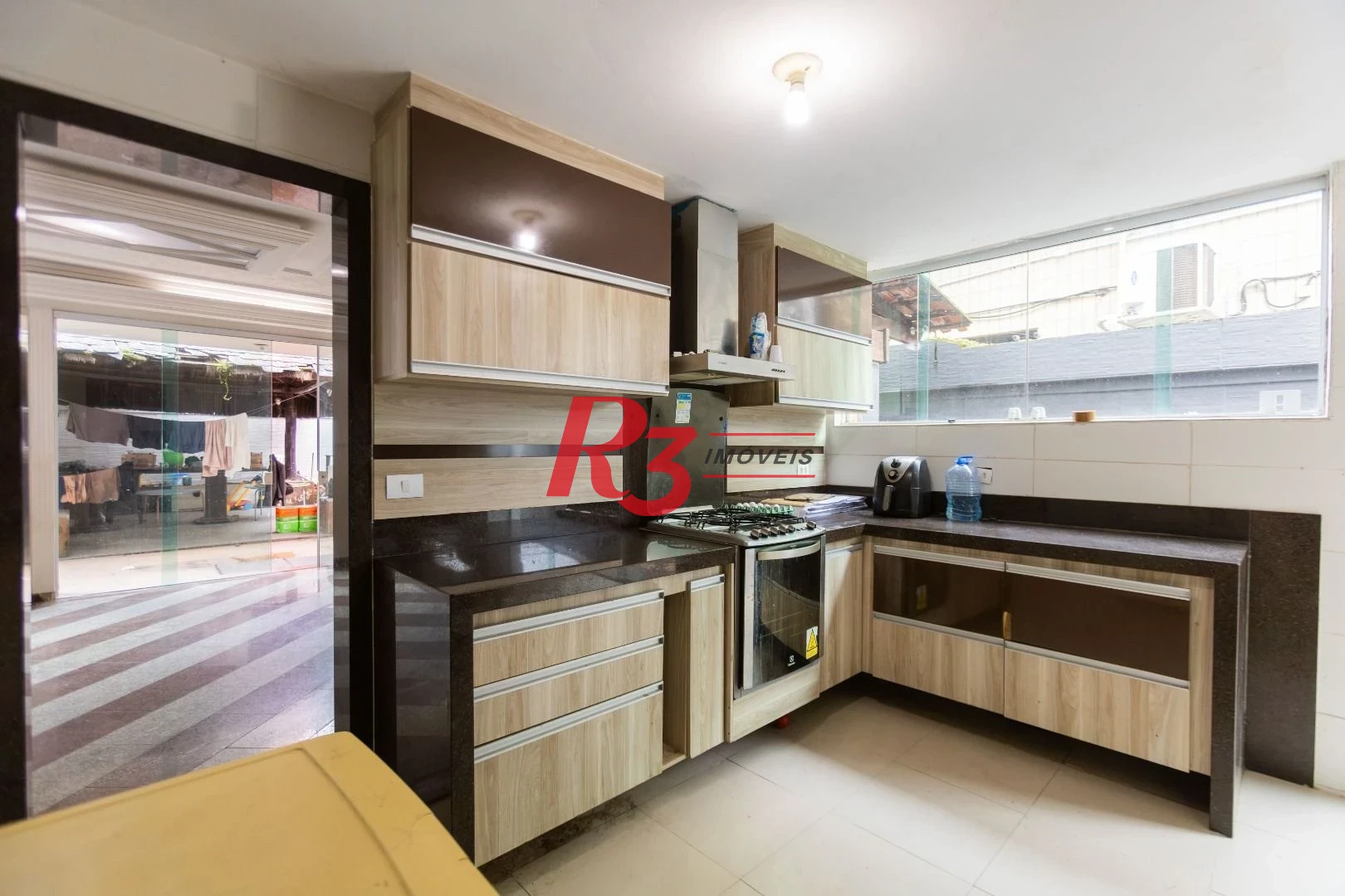 Sobrado com 3 dormitórios à venda, 260 m² por R$ 1.810.000,00 - Ponta da Praia - Santos/SP