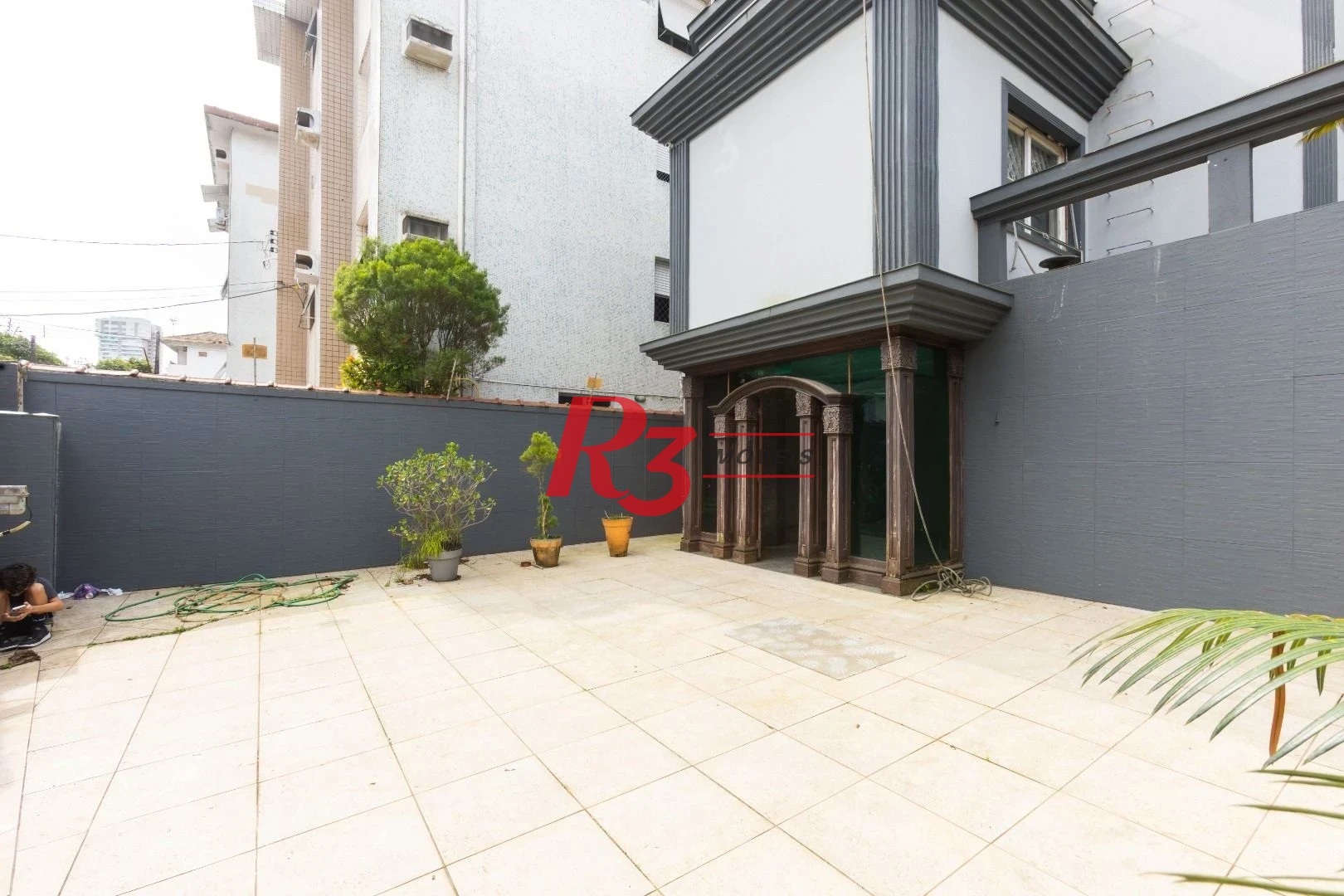 Sobrado com 3 dormitórios à venda, 260 m² por R$ 1.810.000,00 - Ponta da Praia - Santos/SP