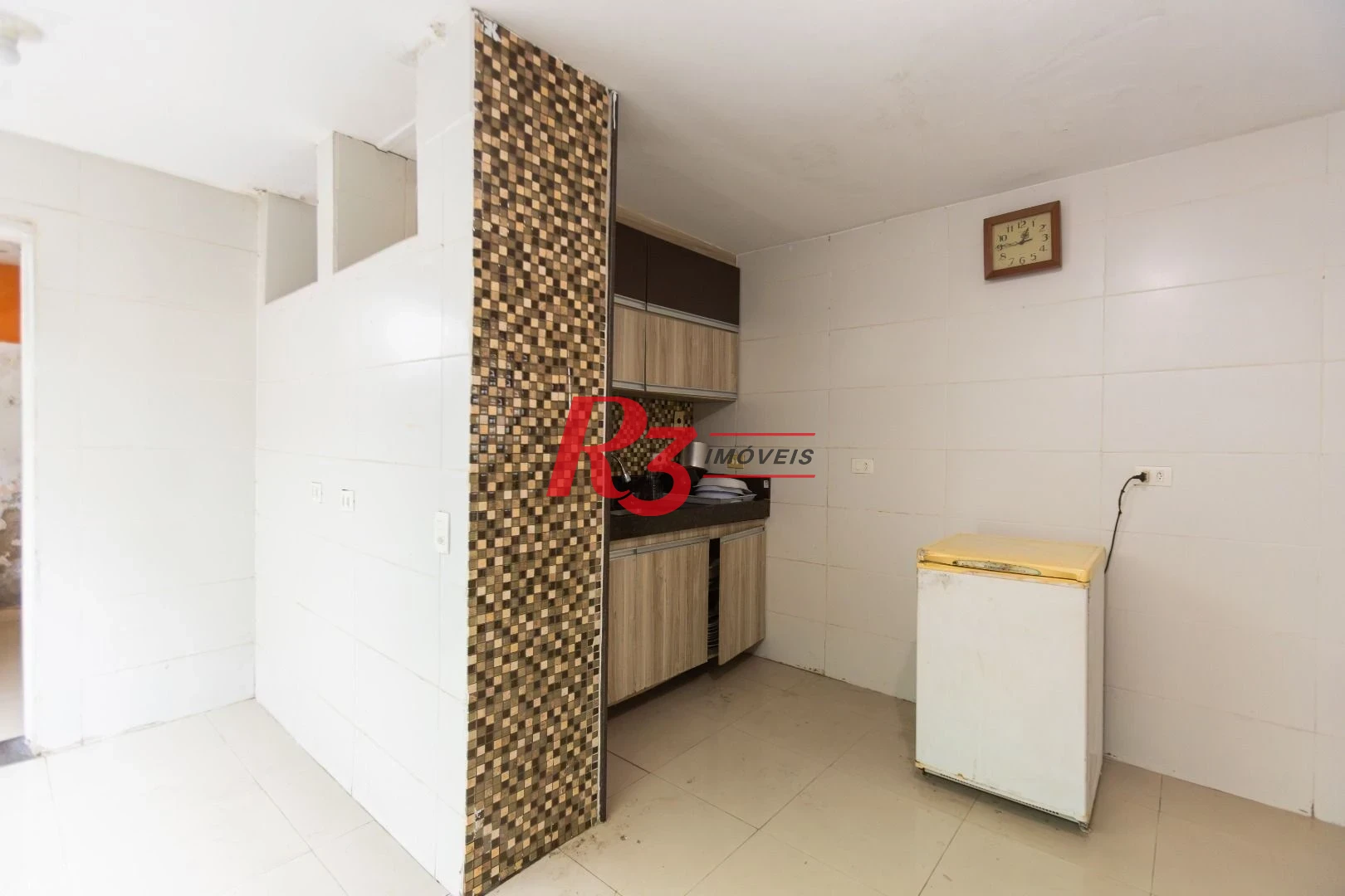 Sobrado com 3 dormitórios à venda, 260 m² por R$ 1.810.000,00 - Ponta da Praia - Santos/SP