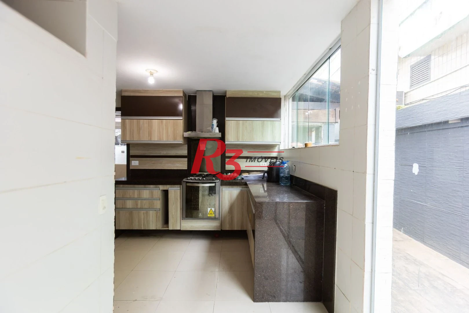 Sobrado com 3 dormitórios à venda, 260 m² por R$ 1.810.000,00 - Ponta da Praia - Santos/SP