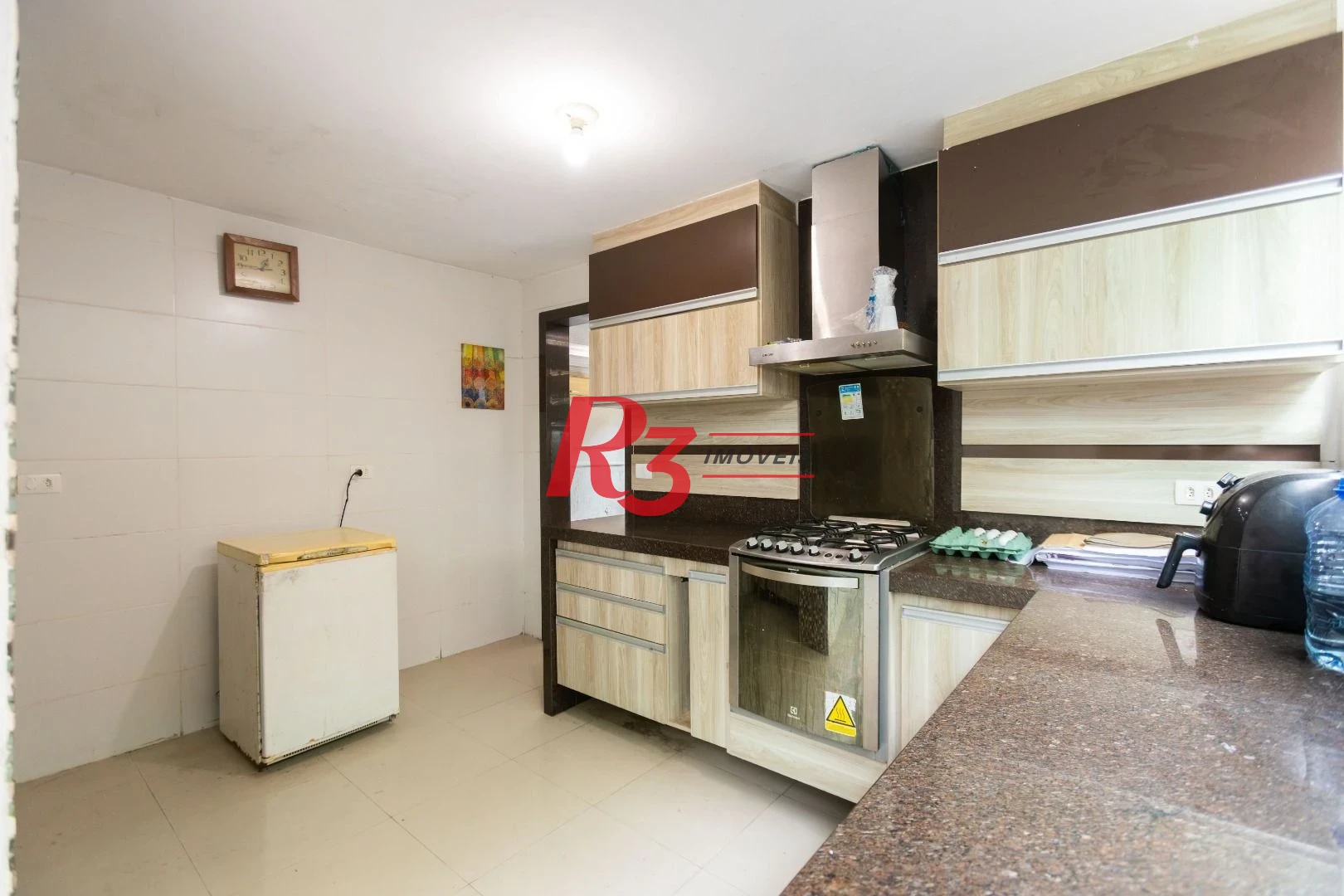 Sobrado com 3 dormitórios à venda, 260 m² por R$ 1.810.000,00 - Ponta da Praia - Santos/SP