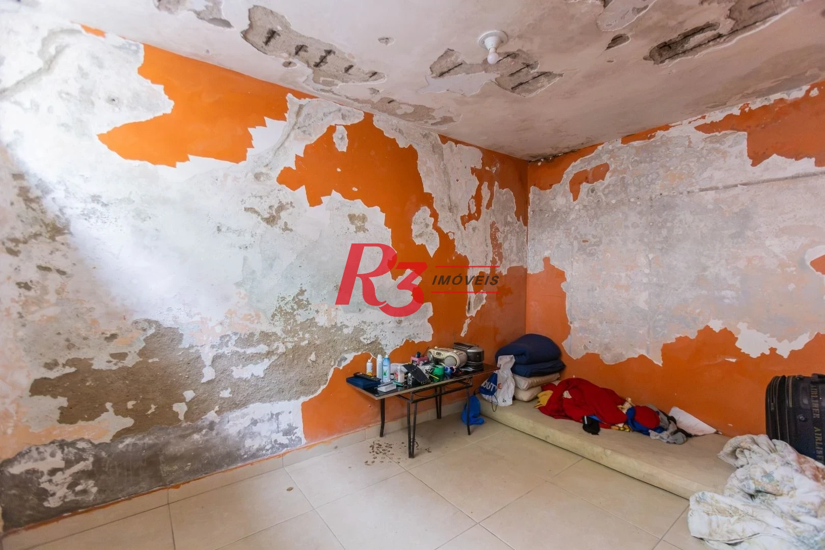 Sobrado com 3 dormitórios à venda, 260 m² por R$ 1.810.000,00 - Ponta da Praia - Santos/SP