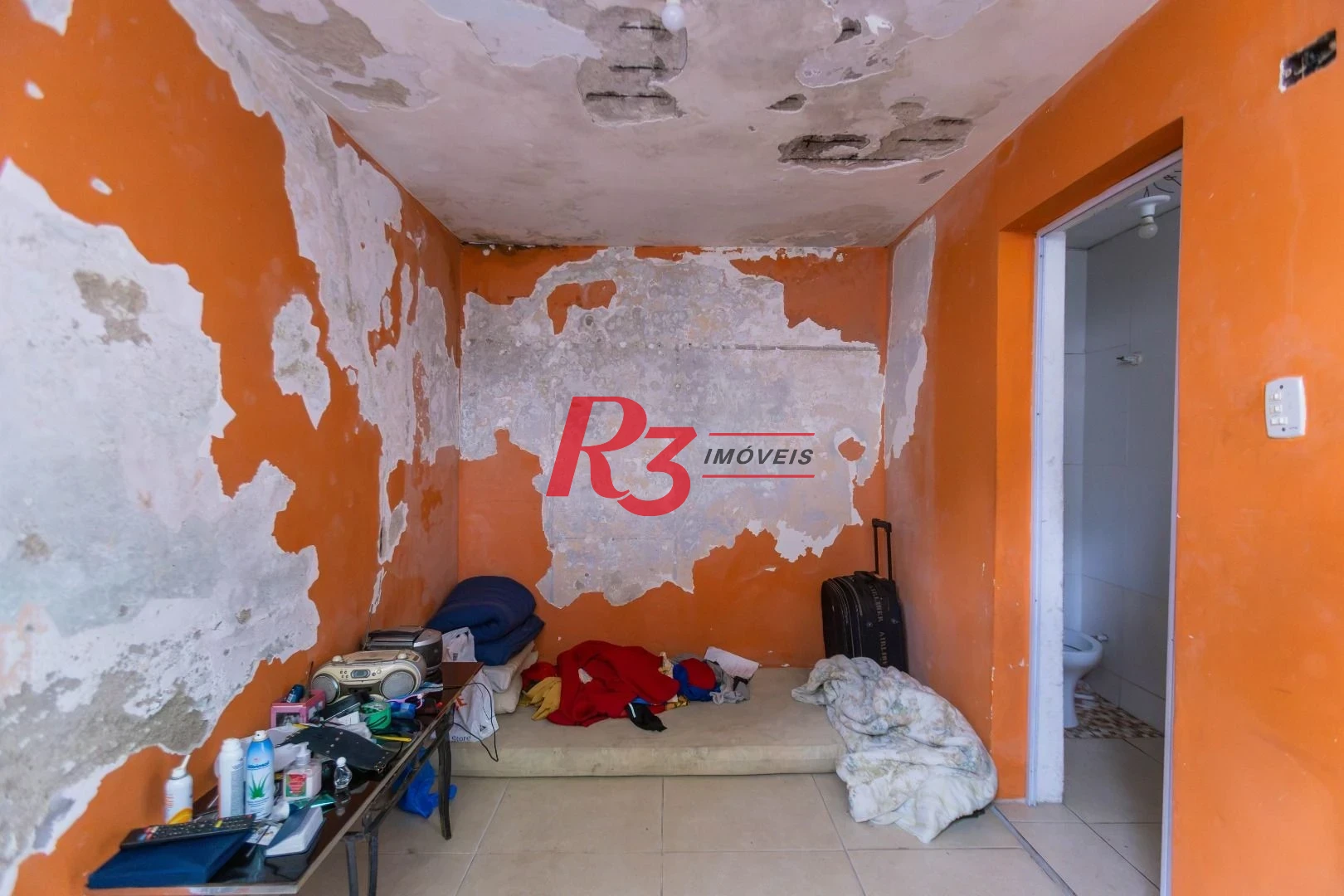 Sobrado com 3 dormitórios à venda, 260 m² por R$ 1.810.000,00 - Ponta da Praia - Santos/SP