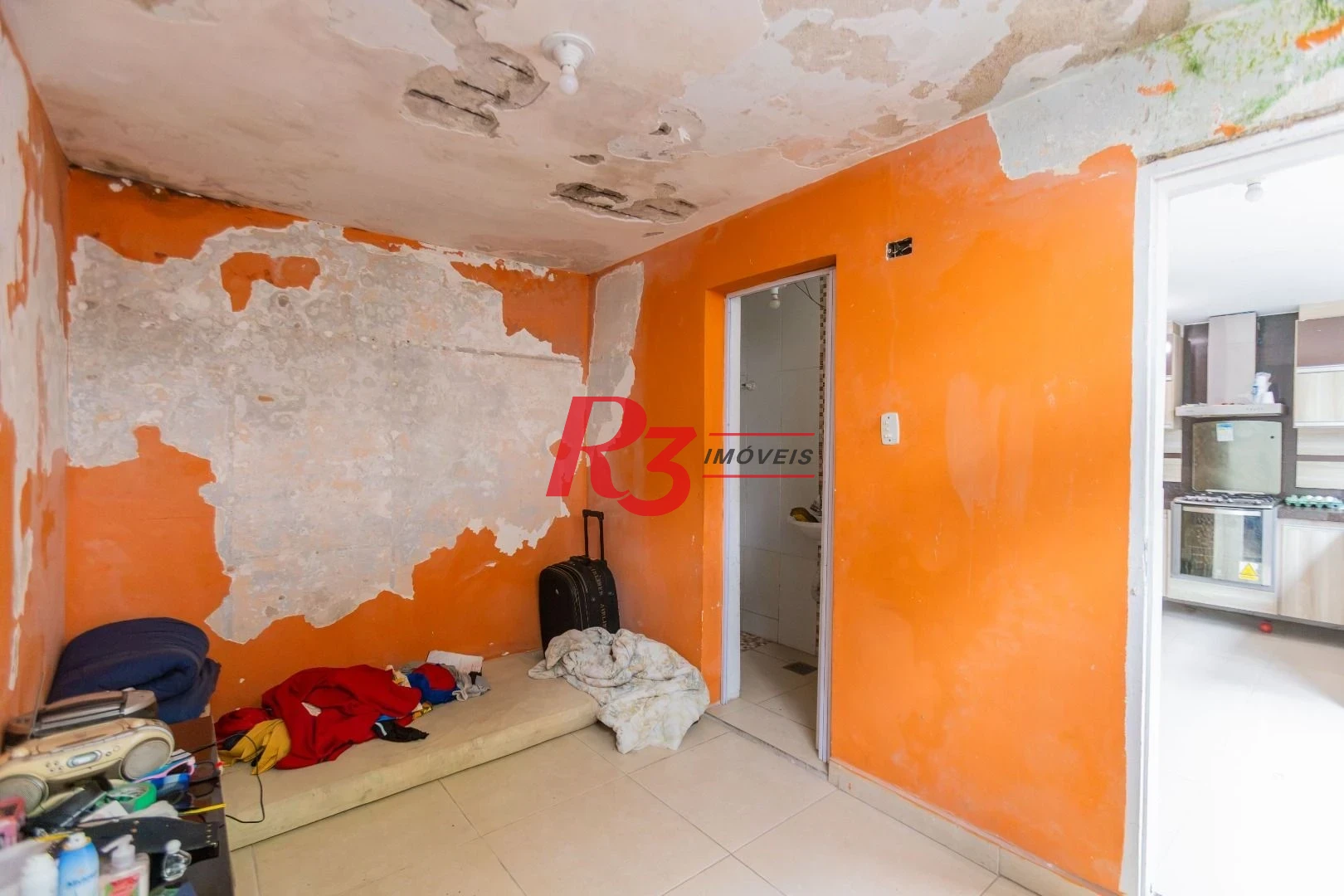 Sobrado com 3 dormitórios à venda, 260 m² por R$ 1.810.000,00 - Ponta da Praia - Santos/SP