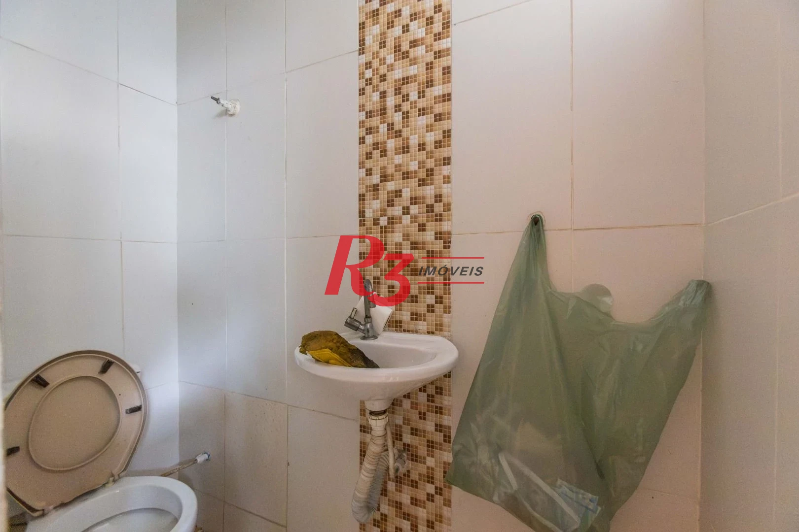 Sobrado com 3 dormitórios à venda, 260 m² por R$ 1.810.000,00 - Ponta da Praia - Santos/SP
