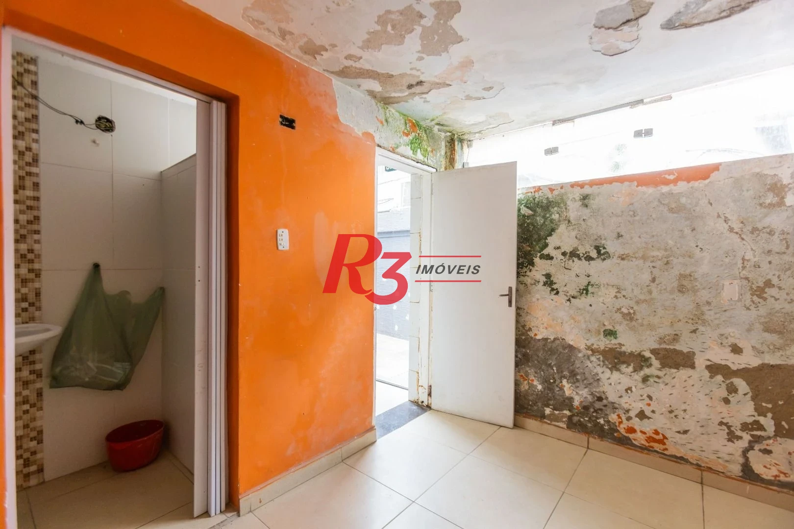 Sobrado com 3 dormitórios à venda, 260 m² por R$ 1.810.000,00 - Ponta da Praia - Santos/SP
