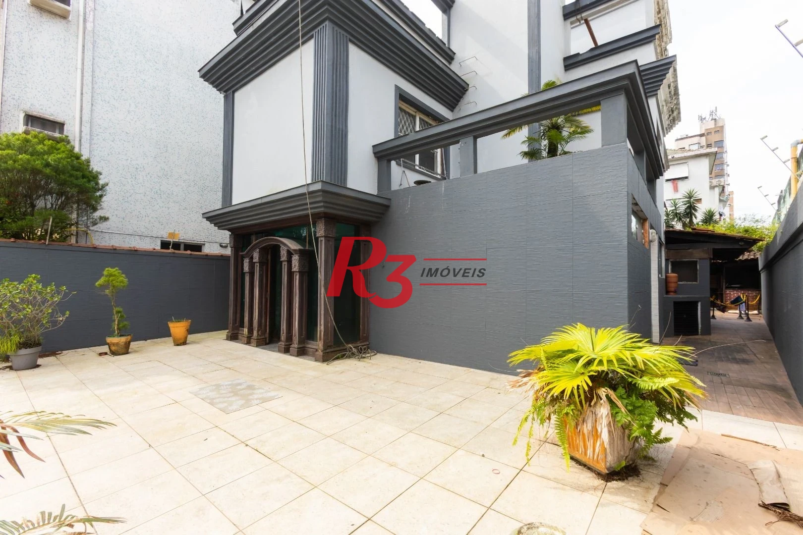 Sobrado com 3 dormitórios à venda, 260 m² por R$ 1.810.000,00 - Ponta da Praia - Santos/SP