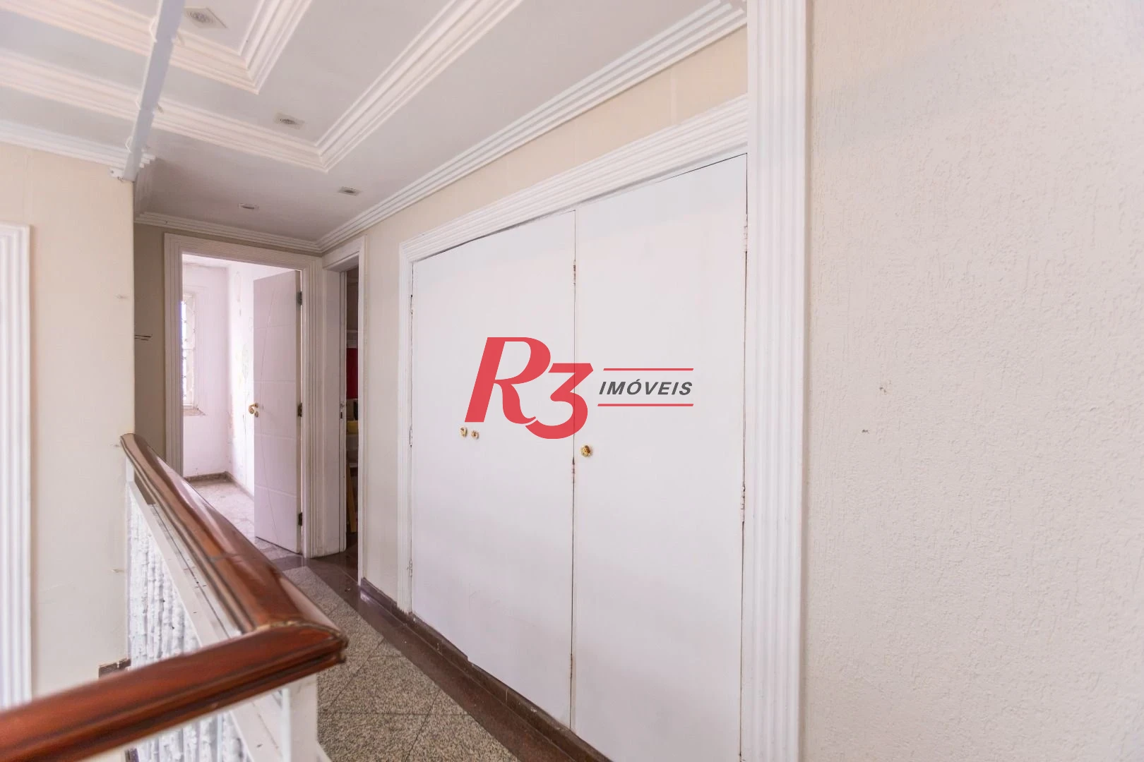 Sobrado com 3 dormitórios à venda, 260 m² por R$ 1.810.000,00 - Ponta da Praia - Santos/SP