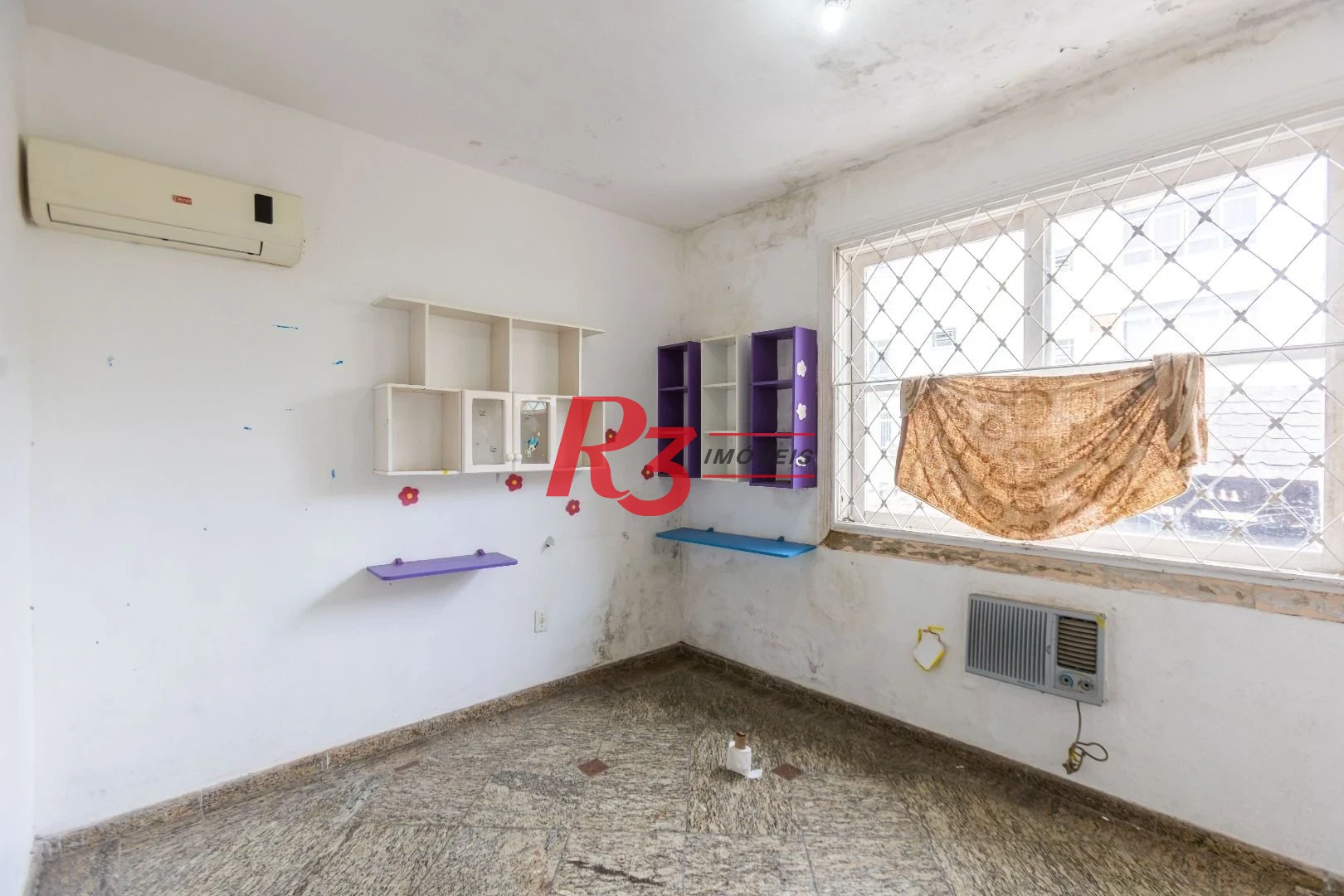 Sobrado com 3 dormitórios à venda, 260 m² por R$ 1.810.000,00 - Ponta da Praia - Santos/SP