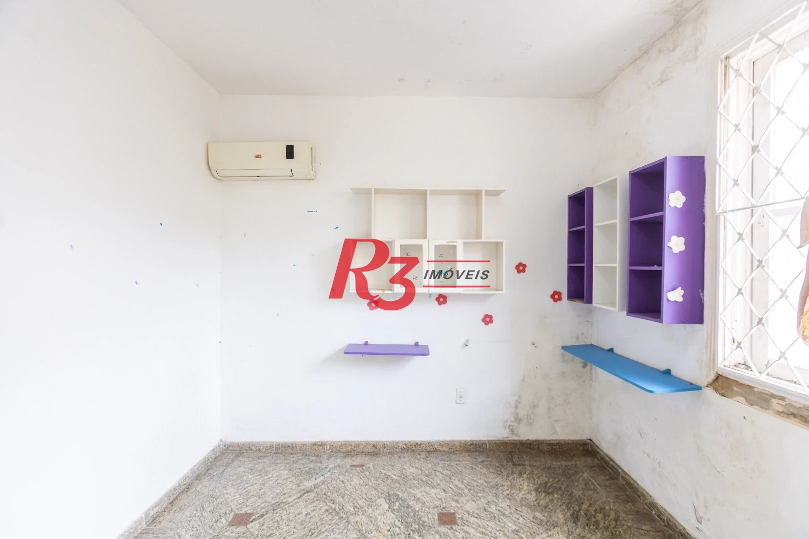 Sobrado com 3 dormitórios à venda, 260 m² por R$ 1.810.000,00 - Ponta da Praia - Santos/SP